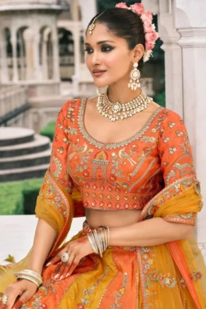 Wedding Special Orange And Yellow Fancy Silk Lehenga